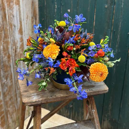 Colourful arrangement with dahlias and Delphinium